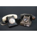 Two mid 20th century dial up telephones.