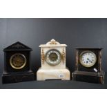 A collection of three antique French slate mantle clocks.