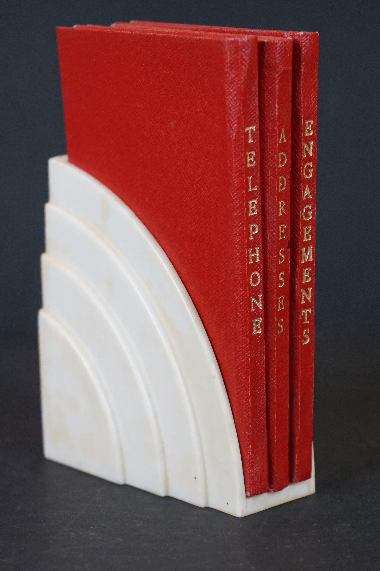 An Art Deco "Ford" desk top book stand to include Telephone, Address and Engagement books.