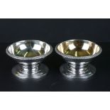 A pair of Victorian fully hallmarked sterling silver dishes with gilt interiors.