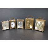 A collection of five contemporary carriage clocks.