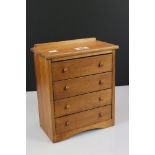 Pine Table Top Jewellery Chest of the form of a Chest of Four Drawers, 28cm high