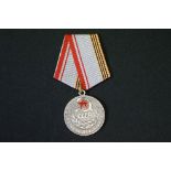 A Russian / USSR Medal For The Veterans Of The Armed Forces, Complete With Original Ribbon.