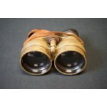 A Pair Of British World War Two Brass Cased Binoculars, Marked REF No.6E/338 Along With The