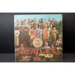 Vinyl - The Beatles Sgt Pepper PMC 7027 mono, with Sold In UK and The Gramophone Co Ltd to label.
