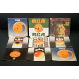 Vinyl & Autographs - 9 7" singles with 5 signed by Ian Hunter and 4 by Mick Ronson. From the