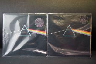 Vinyl - Pink Floyd two copies of Dark Side Of The Moon (SHVL 804). Both have stickered sleeves,