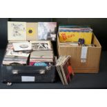 Vinyl - Approx 500 7" & 12" rock n roll singles from the 50's onwards. Contained in a large DJ