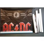 Six rolled posters, to include AC/DC x 2, Bon Jovi, Def Leppard, Jimi Hendrix Total Guitar & Deep