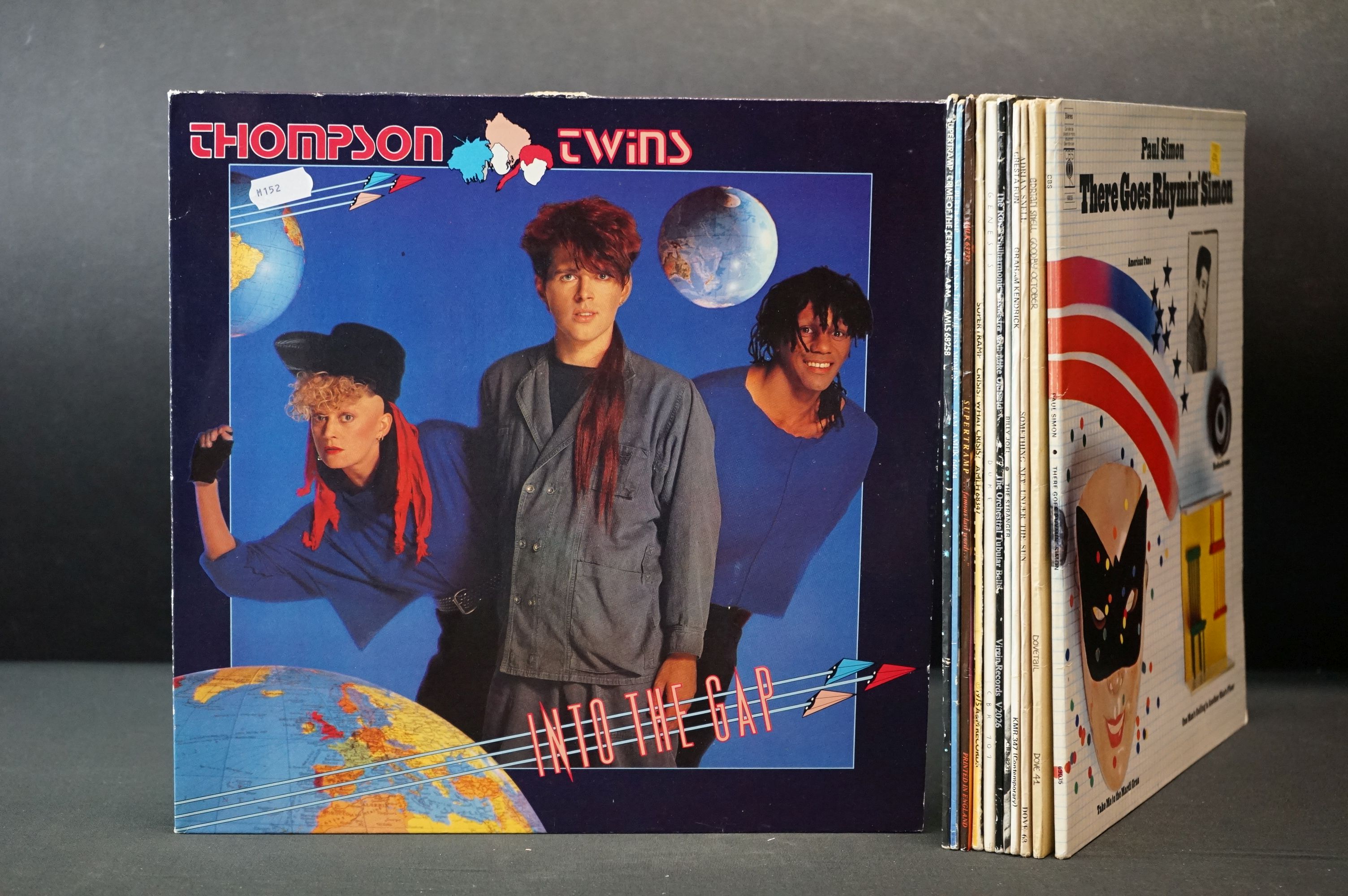 Vinyl - 12 rock & pop LP's to include Genesis, Paul Simon, Supertramp, Thompson Twins, Graham