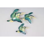 Set of 3 Beswick pottery graduated wall plaques modelled as Kingfishers with printed and impressed