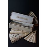 A collection of antique fans to include silk and ivory examples.