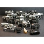 A collection of 35mm SLR camera bodies to include Olympus, Mamiya, Canon, Praktica and Pentax