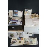 A large collection of first day covers, stamp presentation packs and postcards contained within four