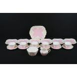 Shelley Dainty Part Tea Set, the bodies decorated in pink and white, the handles decorated in