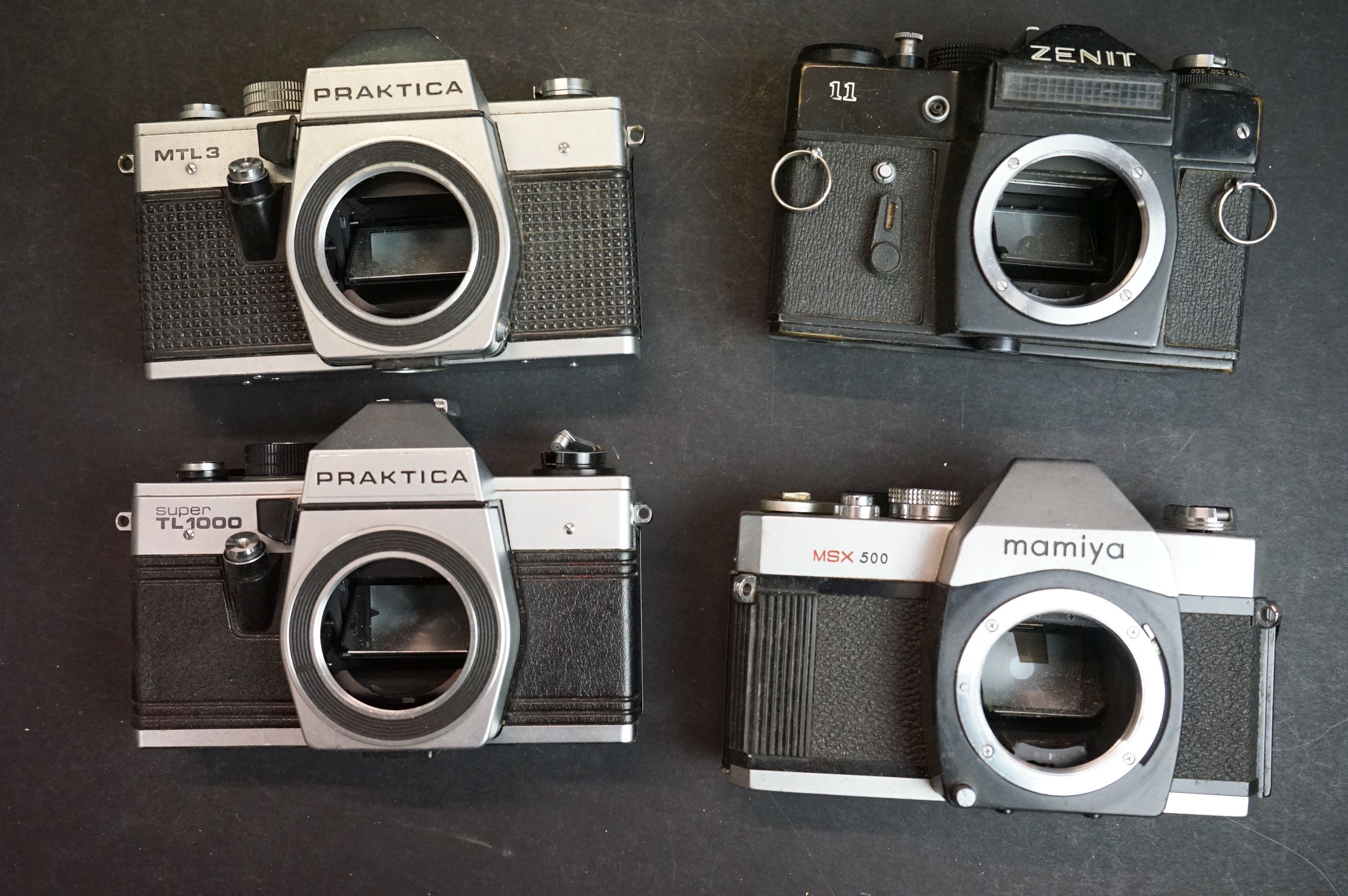 A collection of 35mm SLR camera bodies to include Olympus, Mamiya, Canon, Praktica and Pentax - Image 7 of 10