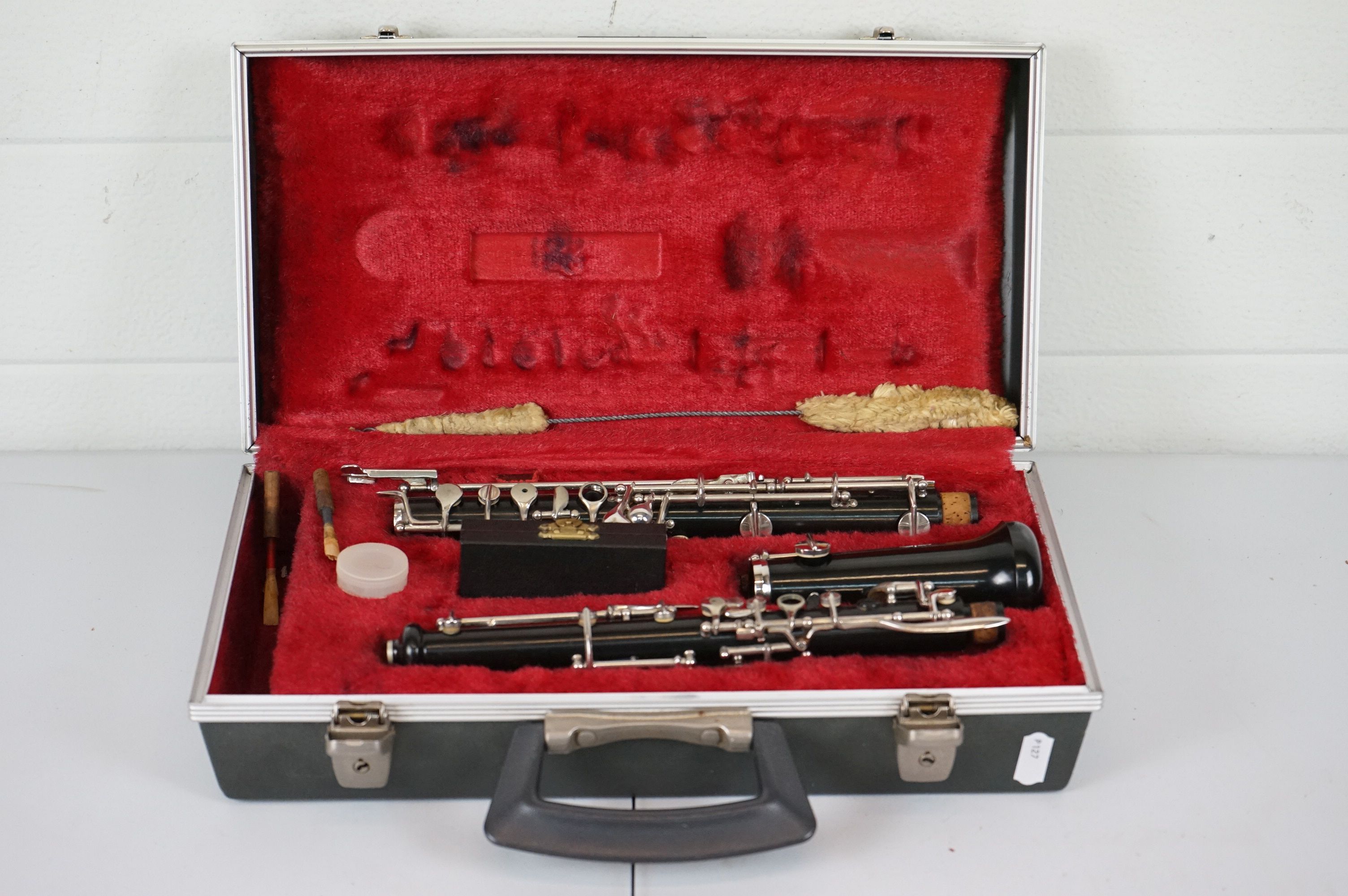 A cased Boosey & Hawkes oboe.