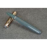 A Parker 51 dove grey fountain pen with rolled gold cap.