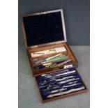 A wooden cased draughtsman's drawing set.