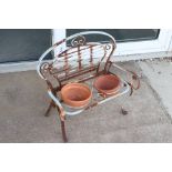 Wrought Iron Garden Planter in the form of a Garden Bench set with two terracotta plant pots, 46cm