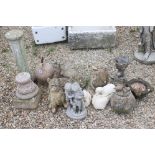 A collection of approx twelve reconstituted stone garden ornaments to include animals and figures.