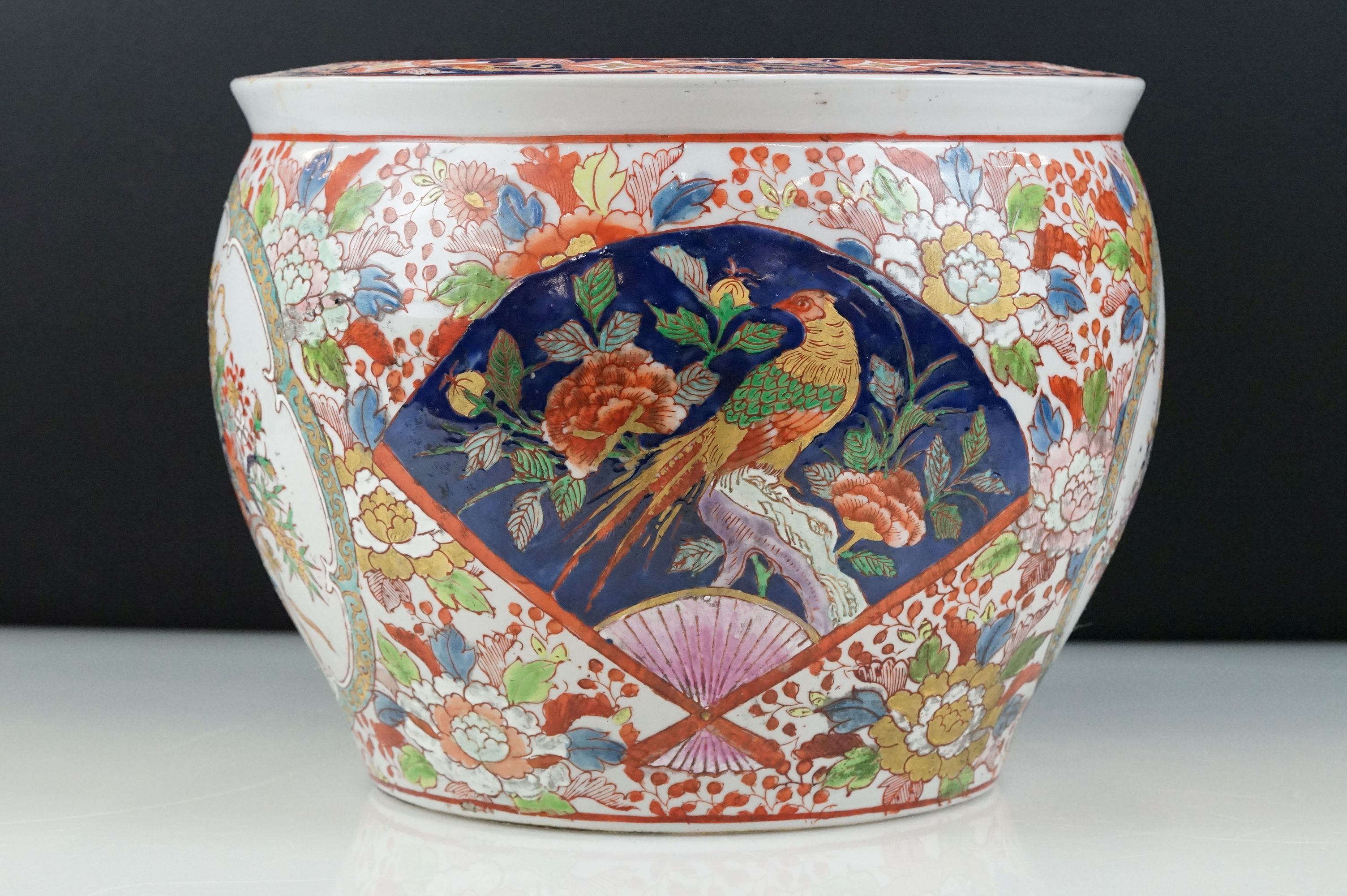 20th century Chinese Stoneware Fish Bowl decorated in a floral pattern of red, greens and blues, - Image 2 of 10