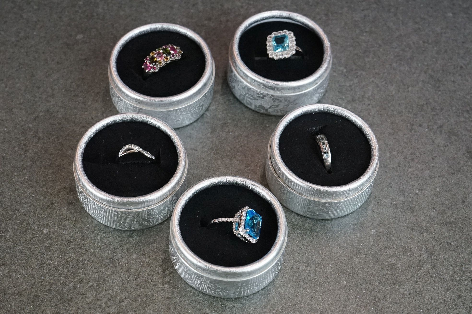 Five silver dress rings