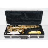 A contemporary brass Alto Saxophone in original fitted case.