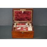 19th century Rosewood Dressing Box, the hinged lid opening to an interior mostly fitted including