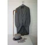 A Gentleman's morning suit to include top hat, jacket, trousers, waistcoat and gloves.