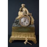 19th century Continental Gilt Brass Figural Mantle Clock, 8 day movement, the case surmounted by a
