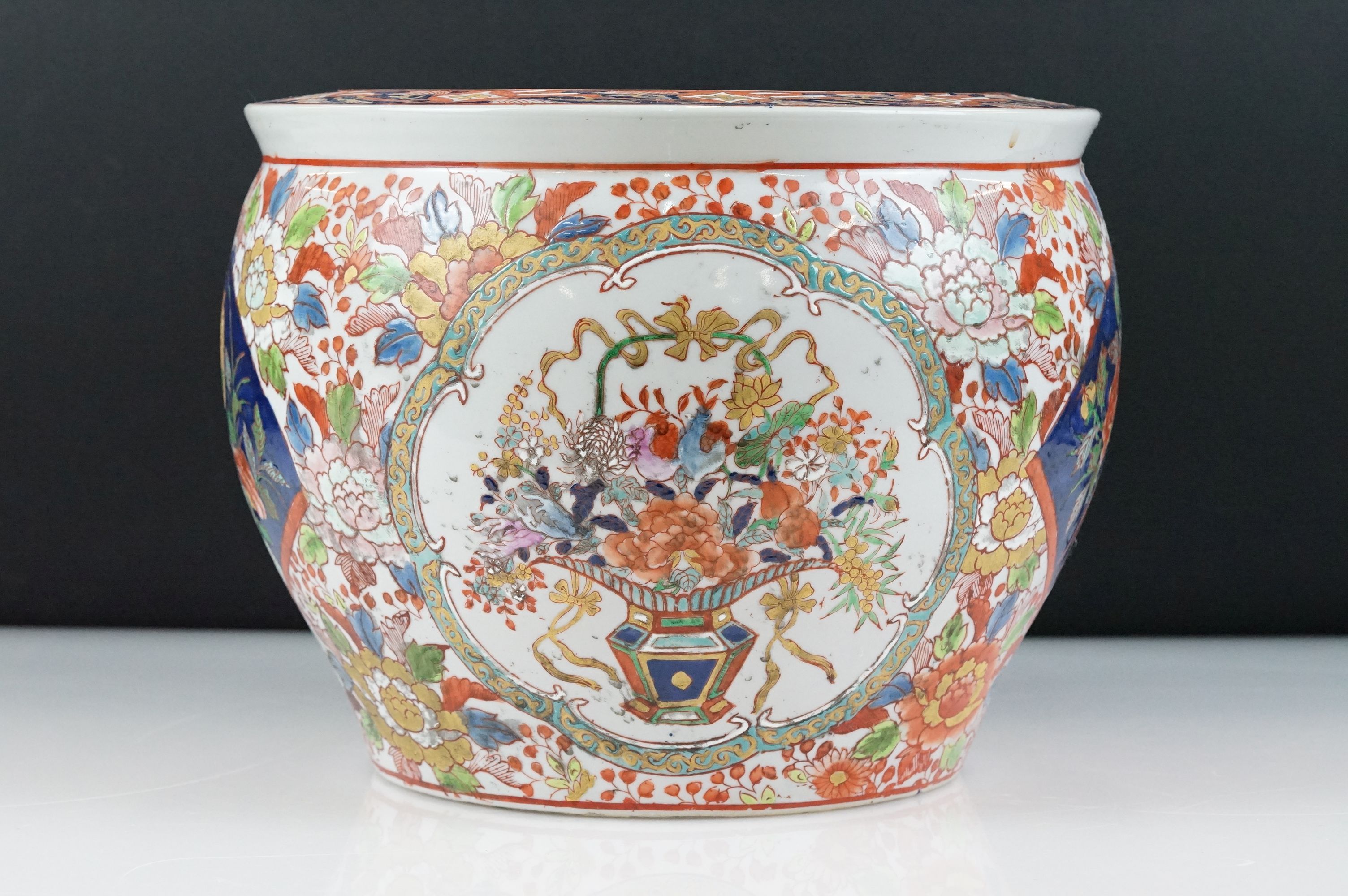 20th century Chinese Stoneware Fish Bowl decorated in a floral pattern of red, greens and blues,