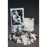 A small collection of black and white photo's depicting nudes.