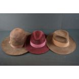 A collection of three gentleman's hats to include a Trilby example.
