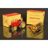 Boxed Dinky 300 Massey Harris Tractor diecast model in red with driver, plus a boxed Dinky 324 Hay