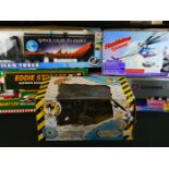 4 Boxed Radio control vehicles to include Humblebee Helicopter, Trucking Kids Scania Truck, Impact