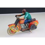 Tin plate clockwork motorcycle and rider, unmarked, gd