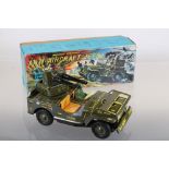 Boxed Japanese Battery Operated Anti Aircraft Jeep tin plate model, vg with minimal wear and gd box