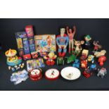 Quantity of mixed toys to include Corgi Magix Roundabout play set, boxed tin plate robots, boxed Pez