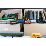 Around 60 OO gauge items of rolling stock to include wagons and coaches featuring Hornby, Triang,