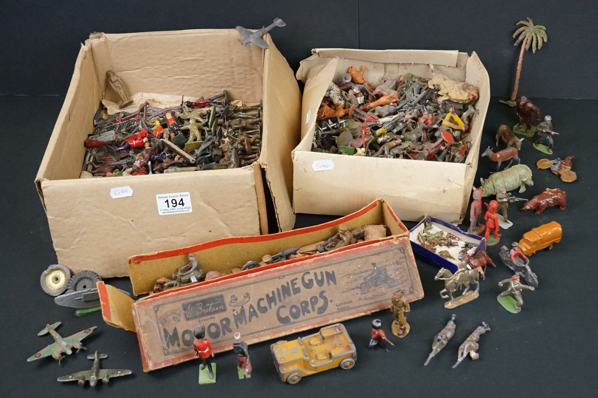 Collection of mid 20th C metal figures to include boxed Britains 199 Motor Machine Gun Corps (