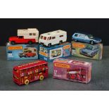 Four boxed Matchbox 75 Series diecast models to include 38 Camper, 17 The Londoner (box with