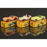 Three boxed Dinky diecast models to include 104 Aston Martin DB35 in pink (box missing two small end