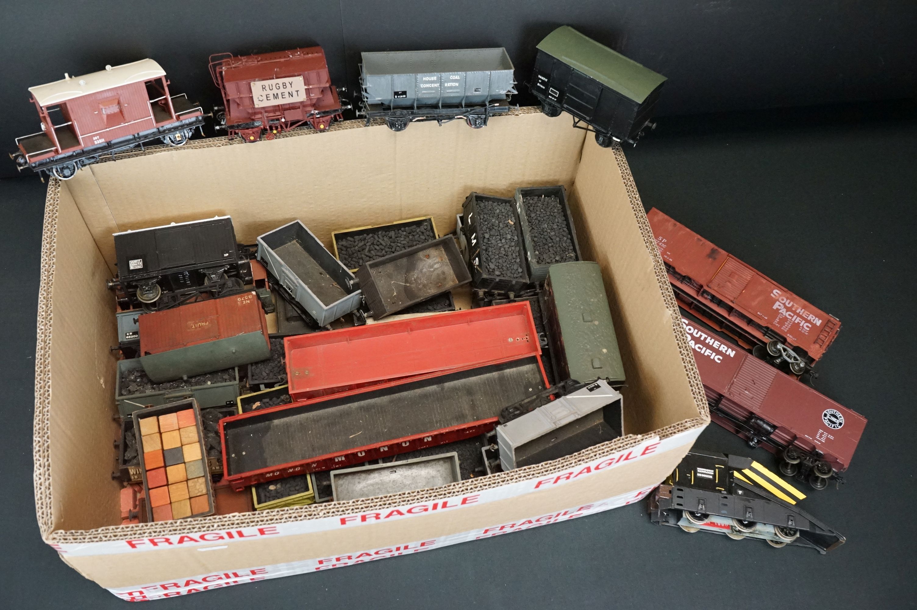 Around 40 O gauge items of rolling stock featuring various makers and kit built examples, to include