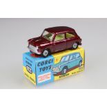 Boxed Corgi 226 Morris Mini Minor diecast model in metallic maroon with yellow interior, a few paint