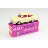 Boxed Tekno 727 DKW Junior de luxe diecast model in cream with red interior, diecast excellent,