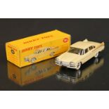 Boxed Dinky 191 Dodge Royal Sedan diecast model in cream, diecast vg with some marks to roof, gd box