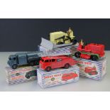 Four boxed Dinky Supertoys diecast models to include 961 Blaw Knox Bulldozer, 955 Fire Engine, 642