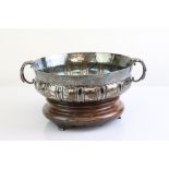 White metal twin handled footed bowl, engraved animal, bird and insect decoration to the border,