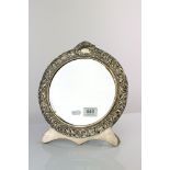 Edwardian silver dressing table easel back mirror, bird and foliate decoration, blank cartouche,